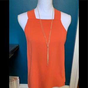 1. State orange cris cross draped back top